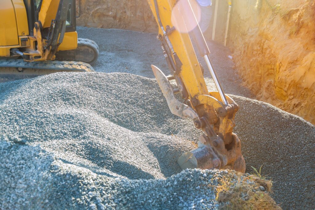 Foundation of the house moving gravel excavator in the construction works